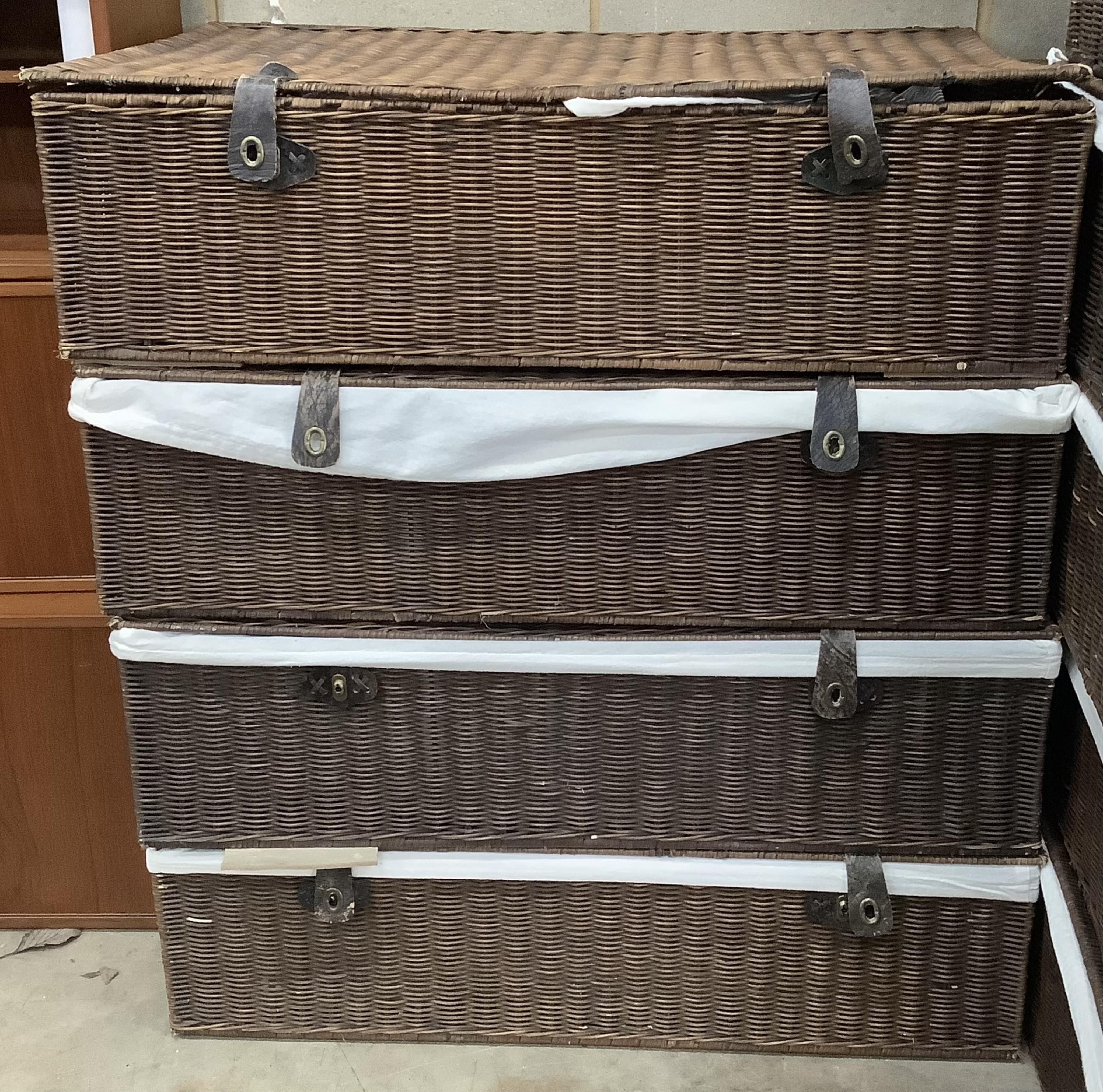 Twelve OKA wicker baskets, each width 88cm, depth 58cm, height 26cm. Condition - fair